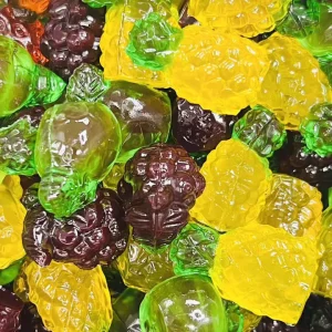 Bulk Halal 4D Fruit Shaped Apple Pineapple Grape Gummy Candies Sour Sweet Flavored Chewy Soft Jelly Candy
