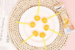 Lactic Acid Fruit Juice Lollipop Spherical Hard Candy Pomelo Flavor Bulk Packed Confectionery for Supermarket