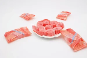 Strawberry Infused Fruit Acid Candy Roll Powder Coated Chewy Liquorice Gummy Sweets Bulk Packed