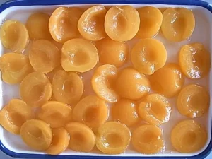 Sweet Apricot Syrup Preserved in Tins Canned Fruit Mass Supply with Water and Sugar B2B Bulk Vendor